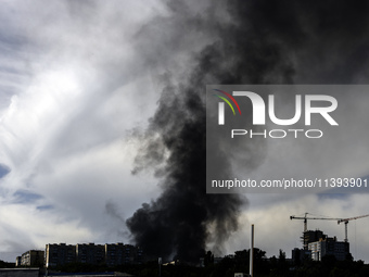 Black smoke is rising in the sky over the city after a Russian missile strike in Kyiv, Ukraine, on July 08, 2024, amid the Russian invasion....