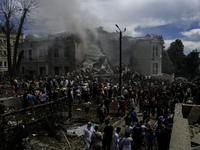 Rescuers and volunteers are working at Ohmatdyt Children's Hospital that was strongly damaged during a Russian missile strike in Kyiv, Ukrai...