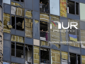 Rescuers and volunteers are working at Ohmatdyt Children's Hospital that was strongly damaged during a Russian missile strike in Kyiv, Ukrai...