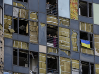 Rescuers and volunteers are working at Ohmatdyt Children's Hospital that was strongly damaged during a Russian missile strike in Kyiv, Ukrai...