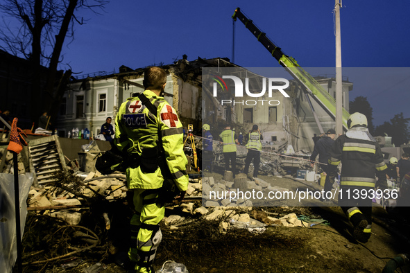 Rescuers are working at Ohmatdyt Children's Hospital that is strongly damaged during a Russian missile strike in Kyiv, Ukraine, on July 08,...