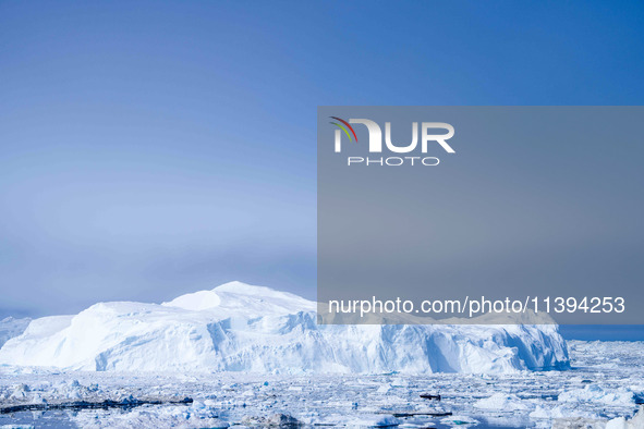 The Ilulissat Icefjord, also known as Sermeq Kujalleq, is draining approximately 7% of Greenland's ice sheet in Ilulissat, Greenland, on Jun...