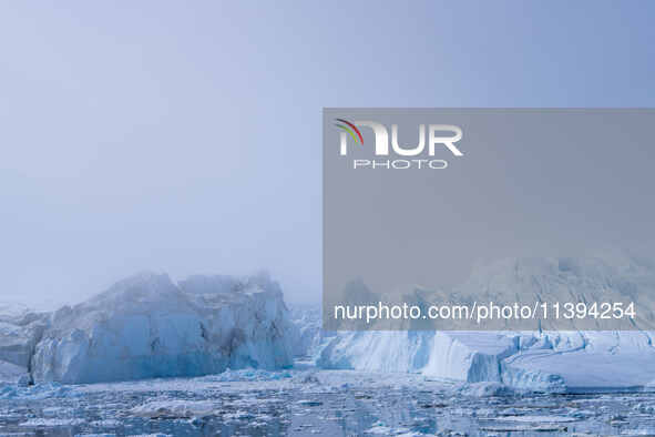 The Ilulissat Icefjord, also known as Sermeq Kujalleq, is draining approximately 7% of Greenland's ice sheet in Ilulissat, Greenland, on Jun...