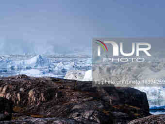 The Ilulissat Icefjord, also known as Sermeq Kujalleq, is draining approximately 7% of Greenland's ice sheet in Ilulissat, Greenland, on Jun...