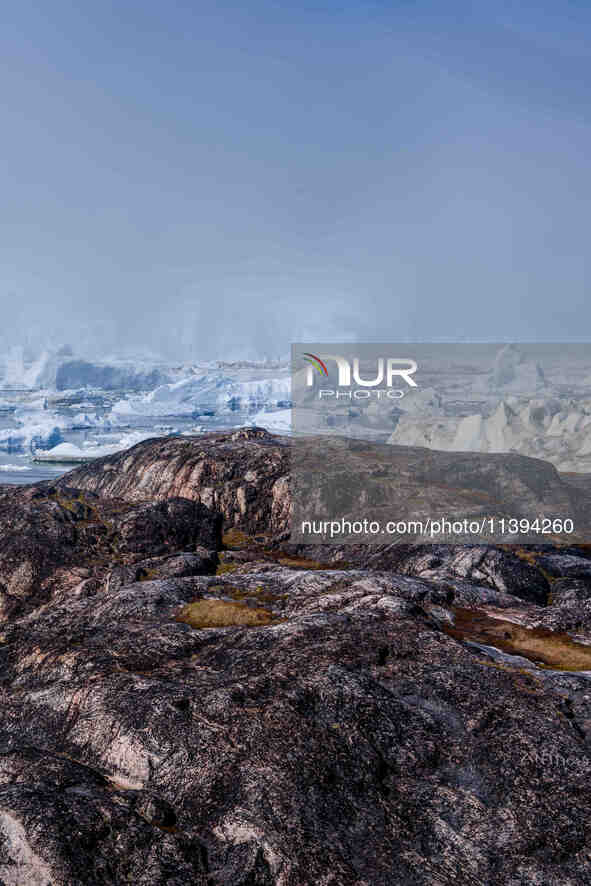 The Ilulissat Icefjord, also known as Sermeq Kujalleq, is draining approximately 7% of Greenland's ice sheet in Ilulissat, Greenland, on Jun...