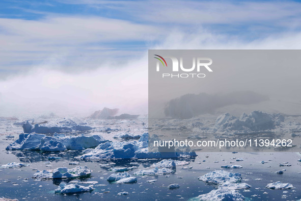 The Ilulissat Icefjord, also known as Sermeq Kujalleq, is draining approximately 7% of Greenland's ice sheet in Ilulissat, Greenland, on Jun...