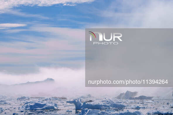 The Ilulissat Icefjord, also known as Sermeq Kujalleq, is draining approximately 7% of Greenland's ice sheet in Ilulissat, Greenland, on Jun...