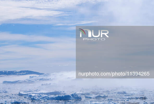 The Ilulissat Icefjord, also known as Sermeq Kujalleq, is draining approximately 7% of Greenland's ice sheet in Ilulissat, Greenland, on Jun...