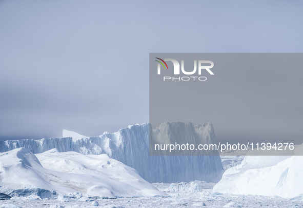 The Ilulissat Icefjord, also known as Sermeq Kujalleq, is draining approximately 7% of Greenland's ice sheet in Ilulissat, Greenland, on Jun...