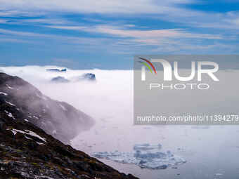 The Ilulissat Icefjord, also known as Sermeq Kujalleq, is draining approximately 7% of Greenland's ice sheet in Ilulissat, Greenland, on Jun...