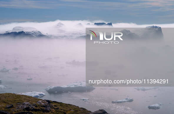 The Ilulissat Icefjord, also known as Sermeq Kujalleq, is draining approximately 7% of Greenland's ice sheet in Ilulissat, Greenland, on Jun...