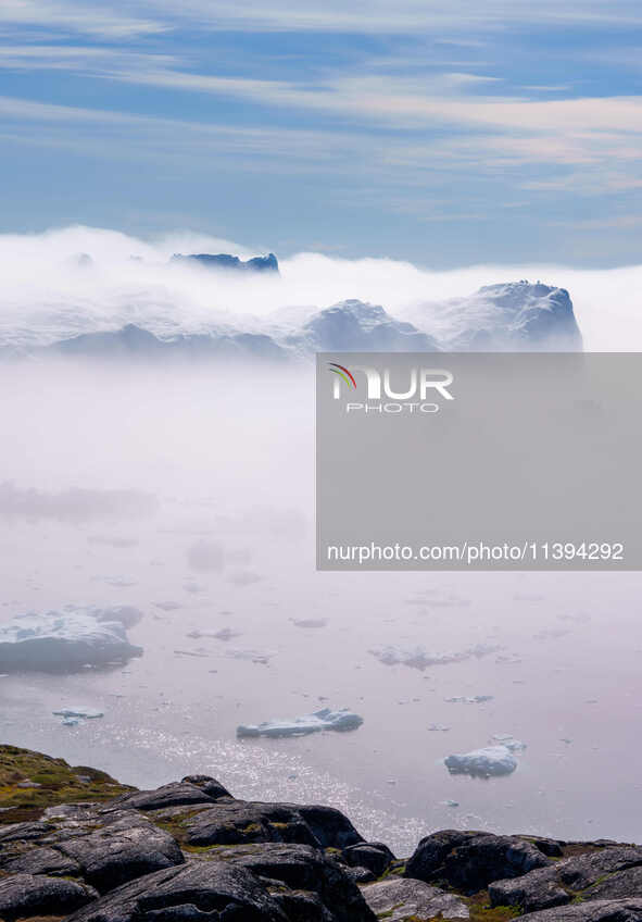 The Ilulissat Icefjord, also known as Sermeq Kujalleq, is draining approximately 7% of Greenland's ice sheet in Ilulissat, Greenland, on Jun...