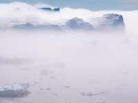 The Ilulissat Icefjord, also known as Sermeq Kujalleq, is draining approximately 7% of Greenland's ice sheet in Ilulissat, Greenland, on Jun...