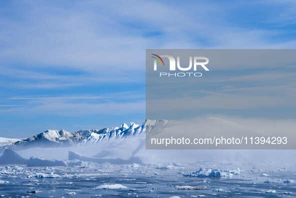 The Ilulissat Icefjord, also known as Sermeq Kujalleq, is draining approximately 7% of Greenland's ice sheet in Ilulissat, Greenland, on Jun...