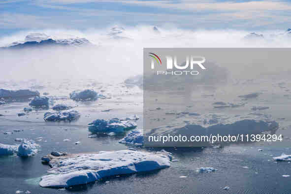 The Ilulissat Icefjord, also known as Sermeq Kujalleq, is draining approximately 7% of Greenland's ice sheet in Ilulissat, Greenland, on Jun...