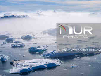 The Ilulissat Icefjord, also known as Sermeq Kujalleq, is draining approximately 7% of Greenland's ice sheet in Ilulissat, Greenland, on Jun...