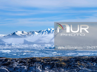 The Ilulissat Icefjord, also known as Sermeq Kujalleq, is draining approximately 7% of Greenland's ice sheet in Ilulissat, Greenland, on Jun...