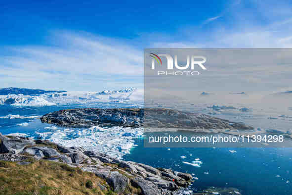 The Ilulissat Icefjord, also known as Sermeq Kujalleq, is draining approximately 7% of Greenland's ice sheet in Ilulissat, Greenland, on Jun...