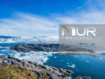 The Ilulissat Icefjord, also known as Sermeq Kujalleq, is draining approximately 7% of Greenland's ice sheet in Ilulissat, Greenland, on Jun...