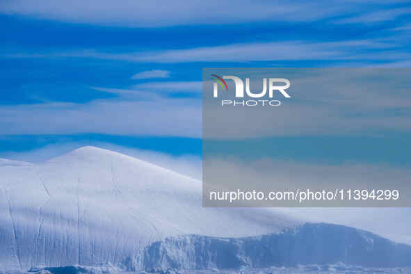 The Ilulissat Icefjord, also known as Sermeq Kujalleq, is draining approximately 7% of Greenland's ice sheet in Ilulissat, Greenland, on Jun...