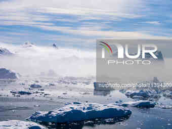 The Ilulissat Icefjord, also known as Sermeq Kujalleq, is draining approximately 7% of Greenland's ice sheet in Ilulissat, Greenland, on Jun...