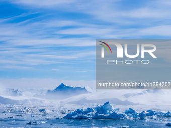 The Ilulissat Icefjord, also known as Sermeq Kujalleq, is draining approximately 7% of Greenland's ice sheet in Ilulissat, Greenland, on Jun...