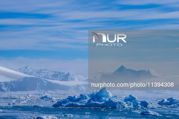 The Ilulissat Icefjord, also known as Sermeq Kujalleq, is draining approximately 7% of Greenland's ice sheet in Ilulissat, Greenland, on Jun...