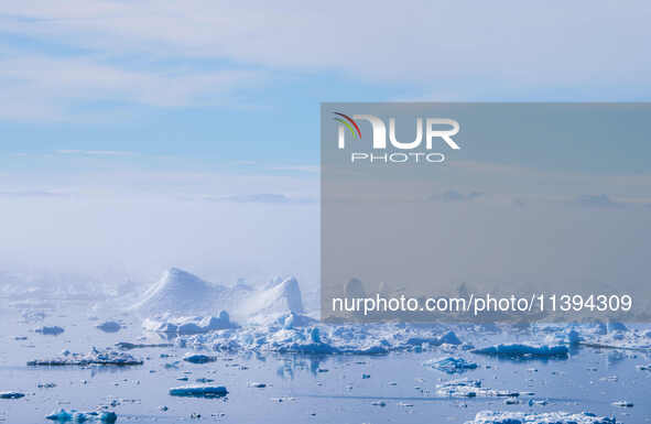 The Ilulissat Icefjord, also known as Sermeq Kujalleq, is draining approximately 7% of Greenland's ice sheet in Ilulissat, Greenland, on Jun...