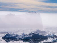 The Ilulissat Icefjord, also known as Sermeq Kujalleq, is draining approximately 7% of Greenland's ice sheet in Ilulissat, Greenland, on Jun...