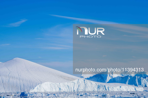 The Ilulissat Icefjord, also known as Sermeq Kujalleq, is draining approximately 7% of Greenland's ice sheet in Ilulissat, Greenland, on Jun...