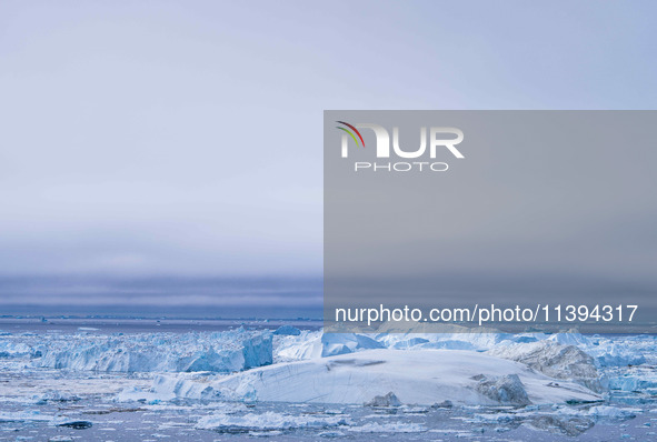 The Ilulissat Icefjord, also known as Sermeq Kujalleq, is draining approximately 7% of Greenland's ice sheet in Ilulissat, Greenland, on Jun...