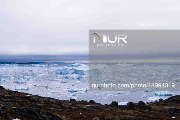 The Ilulissat Icefjord, also known as Sermeq Kujalleq, is draining approximately 7% of Greenland's ice sheet in Ilulissat, Greenland, on Jun...