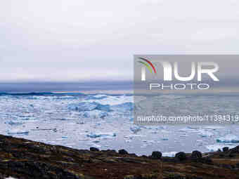 The Ilulissat Icefjord, also known as Sermeq Kujalleq, is draining approximately 7% of Greenland's ice sheet in Ilulissat, Greenland, on Jun...