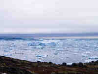 The Ilulissat Icefjord, also known as Sermeq Kujalleq, is draining approximately 7% of Greenland's ice sheet in Ilulissat, Greenland, on Jun...