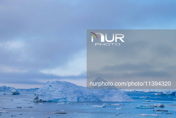 The Ilulissat Icefjord, also known as Sermeq Kujalleq, is draining approximately 7% of Greenland's ice sheet in Ilulissat, Greenland, on Jun...