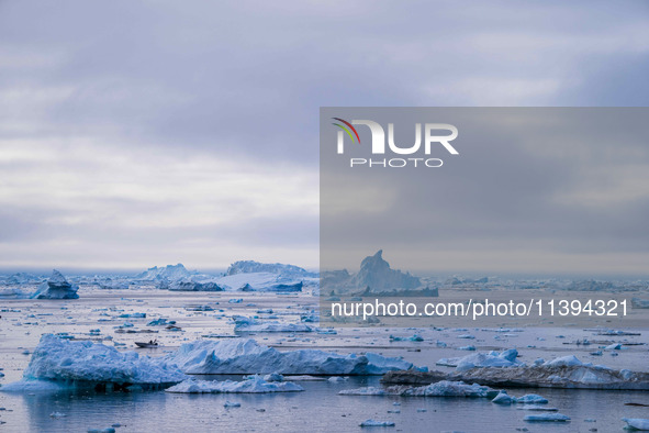 The Ilulissat Icefjord, also known as Sermeq Kujalleq, is draining approximately 7% of Greenland's ice sheet in Ilulissat, Greenland, on Jun...