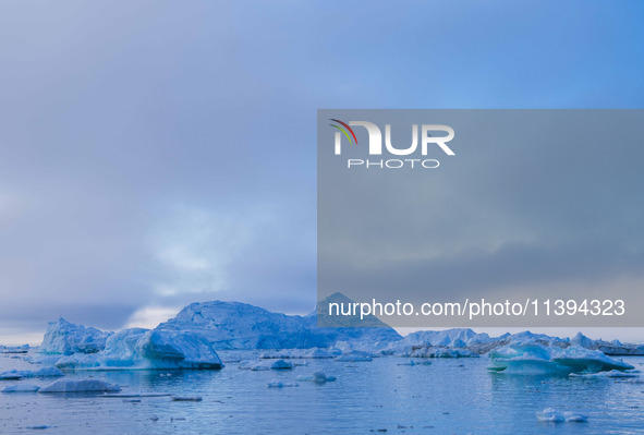 The Ilulissat Icefjord, also known as Sermeq Kujalleq, is draining approximately 7% of Greenland's ice sheet in Ilulissat, Greenland, on Jun...