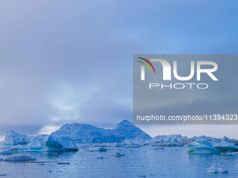 The Ilulissat Icefjord, also known as Sermeq Kujalleq, is draining approximately 7% of Greenland's ice sheet in Ilulissat, Greenland, on Jun...