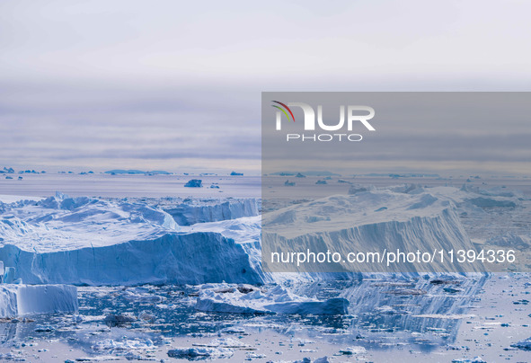 The Ilulissat Icefjord, also known as Sermeq Kujalleq, is draining approximately 7% of Greenland's ice sheet. This glacier, the largest outs...