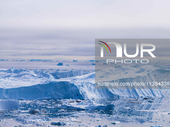 The Ilulissat Icefjord, also known as Sermeq Kujalleq, is draining approximately 7% of Greenland's ice sheet. This glacier, the largest outs...