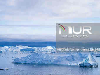 The Ilulissat Icefjord, also known as Sermeq Kujalleq, is draining approximately 7% of Greenland's ice sheet. This glacier, the largest outs...