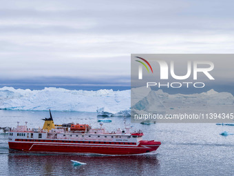 The Ilulissat Icefjord, also known as Sermeq Kujalleq, is draining approximately 7% of Greenland's ice sheet in Ilulissat, Greenland, on Jun...