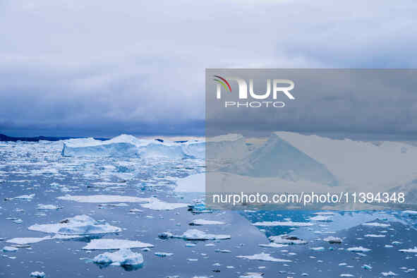 The Ilulissat Icefjord, also known as Sermeq Kujalleq, is draining approximately 7% of Greenland's ice sheet in Ilulissat, Greenland, on Jun...