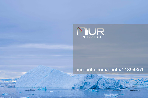 The Ilulissat Icefjord, also known as Sermeq Kujalleq, is draining approximately 7% of Greenland's ice sheet in Ilulissat, Greenland, on Jun...