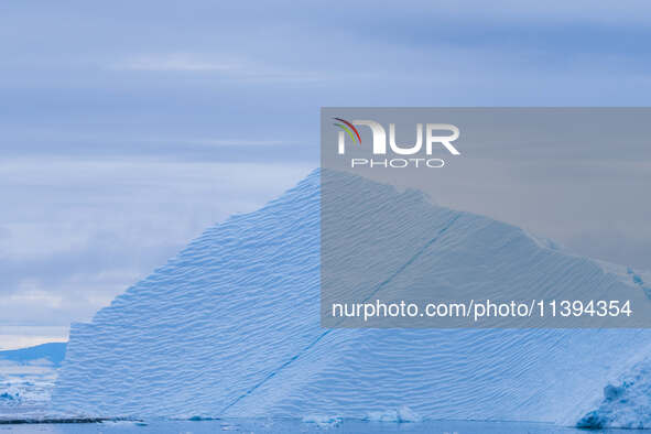 The Ilulissat Icefjord, also known as Sermeq Kujalleq, is draining approximately 7% of Greenland's ice sheet in Ilulissat, Greenland, on Jun...