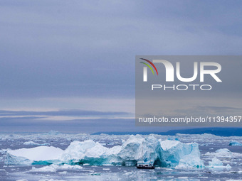 The Ilulissat Icefjord, also known as Sermeq Kujalleq, is draining approximately 7% of Greenland's ice sheet in Ilulissat, Greenland, on Jun...