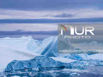 The Ilulissat Icefjord, also known as Sermeq Kujalleq, is draining approximately 7% of Greenland's ice sheet in Ilulissat, Greenland, on Jun...