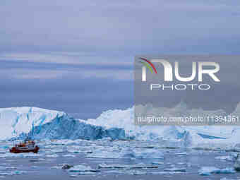 The Ilulissat Icefjord, also known as Sermeq Kujalleq, is draining approximately 7% of Greenland's ice sheet in Ilulissat, Greenland, on Jun...