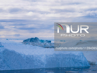 The Ilulissat Icefjord, also known as Sermeq Kujalleq, is draining approximately 7% of Greenland's ice sheet in Ilulissat, Greenland, on Jun...