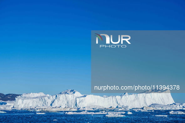 The Ilulissat Icefjord, also known as Sermeq Kujalleq, is draining approximately 7% of Greenland's ice sheet in Ilulissat, Greenland, on Jun...